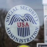 Insider Threat: SSA’s Data Security Nightmare Social Security Administration USA logo on glass door.