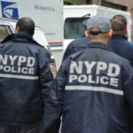 NYPD Scandal: Officers Accused of Brothel Robbery wearing NYPD jackets