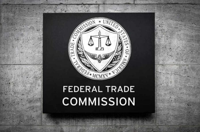 Sign displaying the Federal Trade Commission logo on a concrete wall