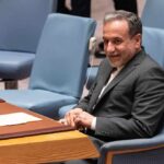 No Ceasefire: Tehran’s Shocking Strategy A man in a suit sitting at a conference table during a UN meeting