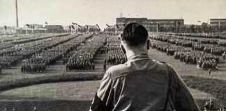 A historical figure overlooking a large military gathering