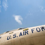 Kuwaiti Heroes Defy ‘Threat’ Narrative Close-up view of a U.S. Air Force aircraft against a blue sky