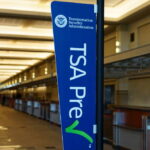 TSA PreCheck sign in an airport terminal