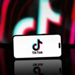 tiktok logo on mobile phone