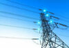 Electricity pylon with blue sky background