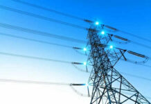 Electricity pylon with blue sky background