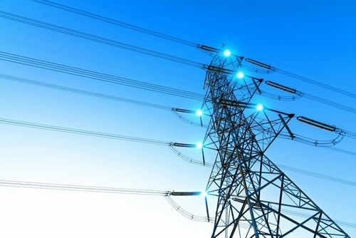 Electricity pylon with blue sky background