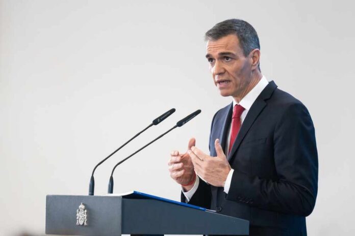 A government official delivering a speech at a podium