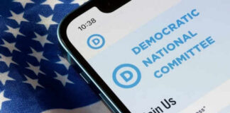 Phone screen displaying Democratic National Committee website.