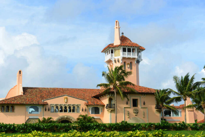 Mar-a-lago,On,Palm,Beach,Island,,Palm,Beach,,Florida,,Usa.,Mar-a-lago Aerial view of a coastal property with luxury homes and a golf course