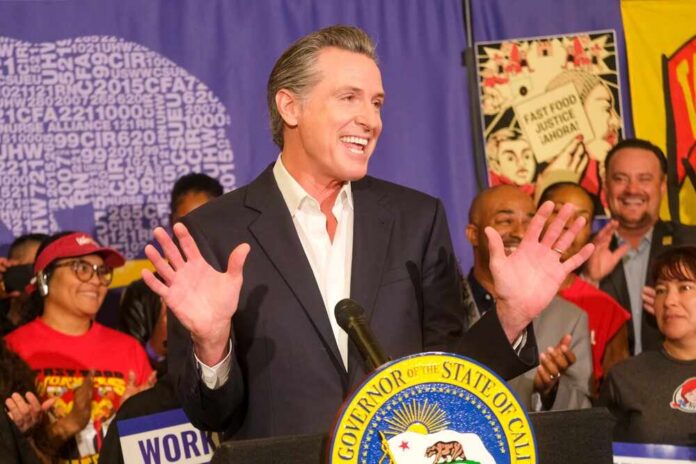 California governor speaking at a public event with supporters