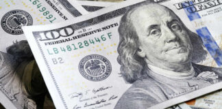 Several US one hundred dollar bills
