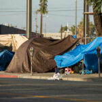 Judge Flags ‘Obvious Fraud’ in LA — Funds Halted Street encampment with tarps and makeshift shelters