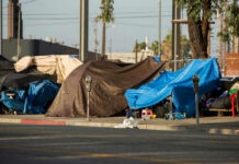 Judge Flags ‘Obvious Fraud’ in LA — Funds Halted Street encampment with tarps and makeshift shelters