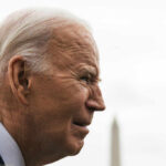 elderly man in profile outdoors