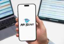 Constitutional Tripwire Stops MrBeast Mania Smartphone displaying MrBeast logo held in hand