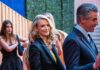Whistleblowers Shatter Newsom Revenge Tale Person speaks at podium with California seal behind.