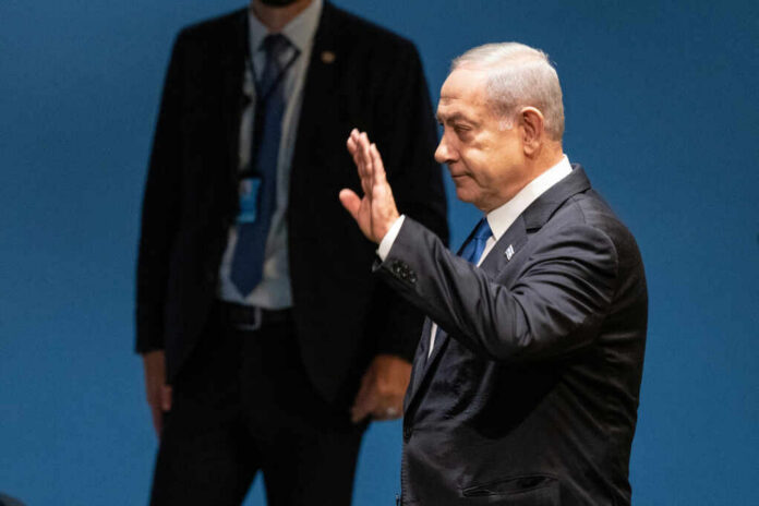 Benjamin-Netanyahu-leaves-after_2365708563 I dont know who this person is waving