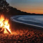 European Maldives? Sewage Tells Otherwise Beach bonfire at dusk by the shoreline