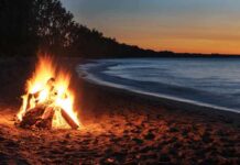 European Maldives? Sewage Tells Otherwise Beach bonfire at dusk by the shoreline