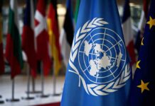 UN Shock: Hamas Links Inside Aid Agency? United Nations flag among international flags
