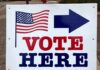 CIA Memo Exposes Audit-Proof Vote Playbook voting sign with arrow and American flag
