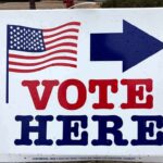 CIA Memo Exposes Audit-Proof Vote Playbook voting sign with arrow and American flag