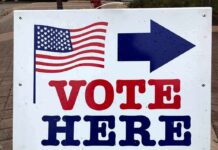 CIA Memo Exposes Audit-Proof Vote Playbook voting sign with arrow and American flag