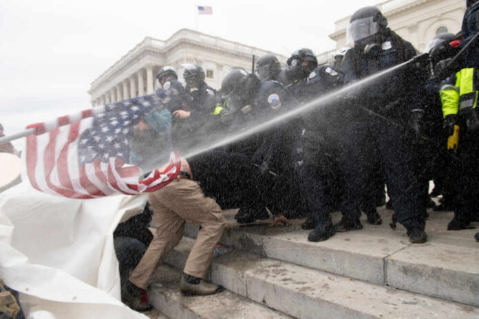 Police vehicle parked in front of the Capitol building