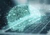 Trump’s Pentagon Supercharges AI War Tech digital brain hologram over a laptop keyboard