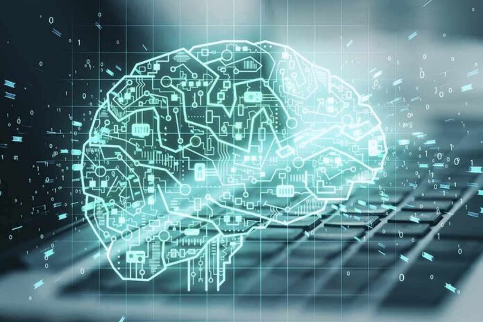 shutterstock_1903888417 digital brain hologram over a laptop keyboard