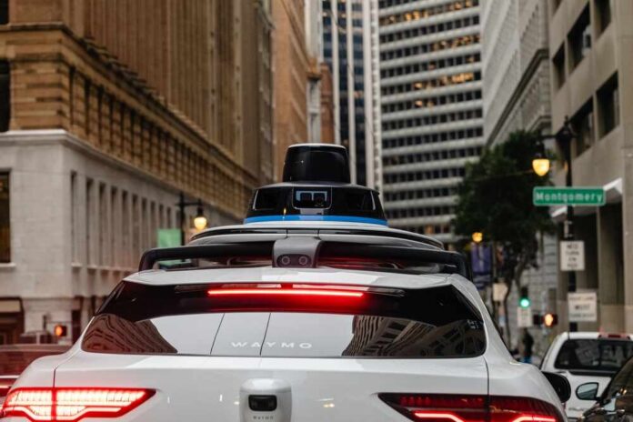 San,Franciso,,California,,Usa,,February,3,,2024:,Waymo,Self Rear view of a Waymo autonomous vehicle on a city street