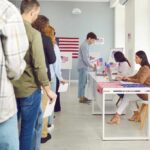 Criminal Heat Hits State Election Offices People waiting in line at a polling station to cast their votes