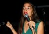 Democrats Meltdown Over Israel Cash Woman speaking into a microphone on stage