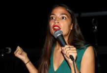 Democrats Meltdown Over Israel Cash Woman speaking into a microphone on stage