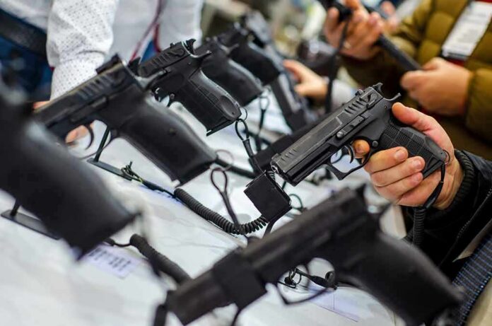 Handguns on display at a store counter
