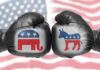 Carville Cornered—Defy the ‘Socialist Surge’ Two boxing gloves with elephant and donkey symbols facing off