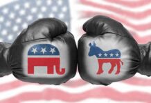 Carville Cornered—Defy the ‘Socialist Surge’ Two boxing gloves with elephant and donkey symbols facing off