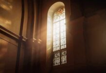 Rising Anti-Christian Attacks Exposed sunlit stained glass window in a church interior