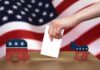 Election Takeover? Martial Law Murmurs Hand casting ballot between Republican elephant and Democratic donkey