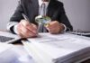 47,000 Addresses? Judges Hit the Brakes Businessperson examining invoices with a magnifying glass