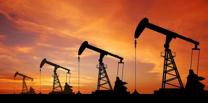 shutterstock_115189144-2 oil pumpjacks silhouetted at sunset