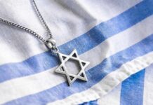 Hamas Plot Exposed: Berlin, Vienna on Edge Star of David pendant on blue and white cloth