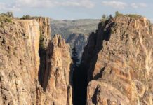 Park Budgets Gutted – $67 Million Vanishes Into Washington Steep canyon cliffs with a narrow chasm and scattered pines