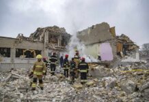 4 American Tourists Killed at The Acropolis Firefighters search rubble of a partially collapsed building