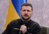 War Fatigue: Rising Distrust Shadows Ukraine’s Leader man holding a microphone during a talk