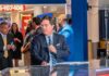 Receipts Or Retract: Hanson Corners Tucker Tucker Carlson at a news desk in a busy studio setting