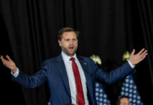 Public Execution Online? Vance Rejects Pentagon’s Grim Show man in suit speaking with arms outstretched