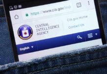 CIA Insider, Luxury Loot – Case On Ice Smartphone showing CIA website in a denim pocket