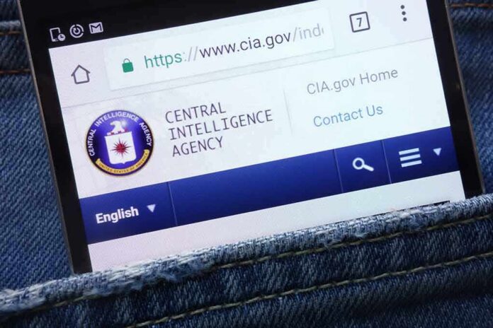 Smartphone showing CIA website in a denim pocket